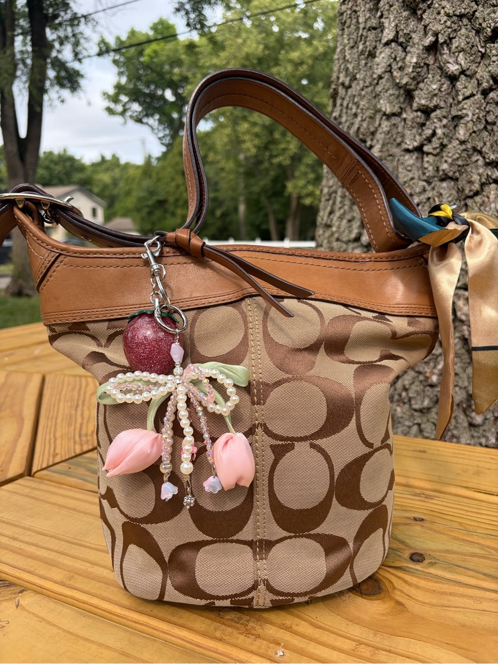 Coach Brown Signature Canvas Hobo with Leather Trim and Strawberry Charm